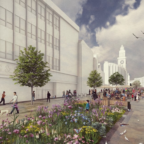 Visualisation of a regenerated city street with wide pedestrian areas, trees, and flower beds. People are walking, sitting on benches, and socializing along the pavement. The left side features a large building with ‘Marks &’ visible on the wall, while the right side has outdoor seating. In the distance, a clock tower rises above white buildings under a partly cloudy sky, with birds flying overhead.