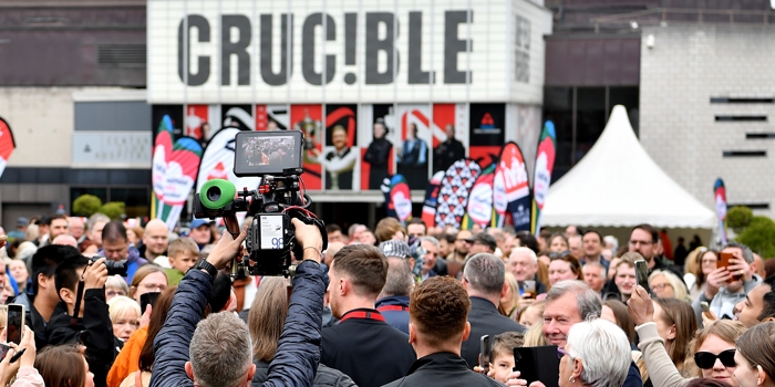 Tudor Square, in Sheffield city centre, is thronging with people, who have come to watch the snooker at The Crucible.