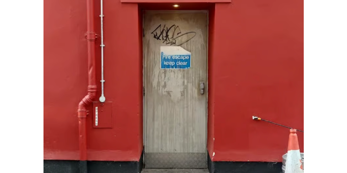 The entrance to Not Open; Don't Come.