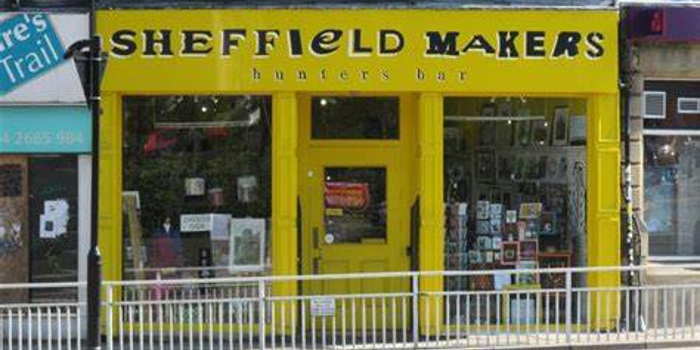 The bright yellow exterior of Sheffield Makers Hunters Bar.