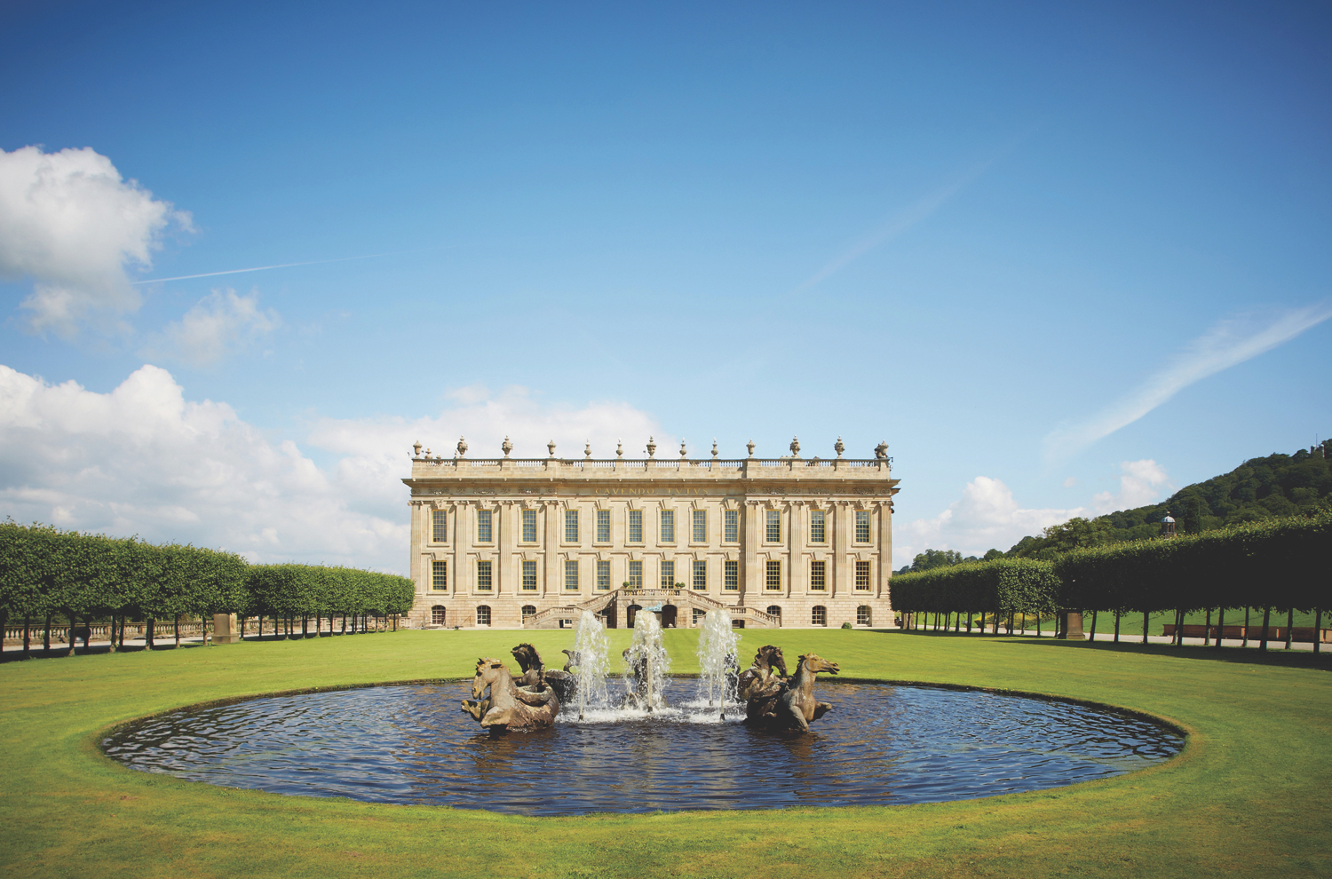 Chatsworth House and ornamental fountain.