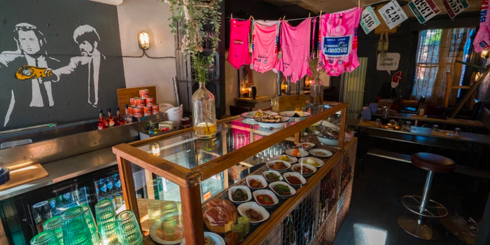 The counter at North Town, with a glass case filled with goods for sale.